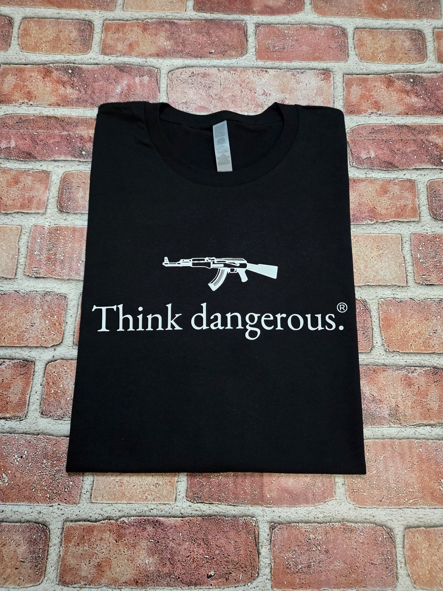 Think dangerous. T-Shirt