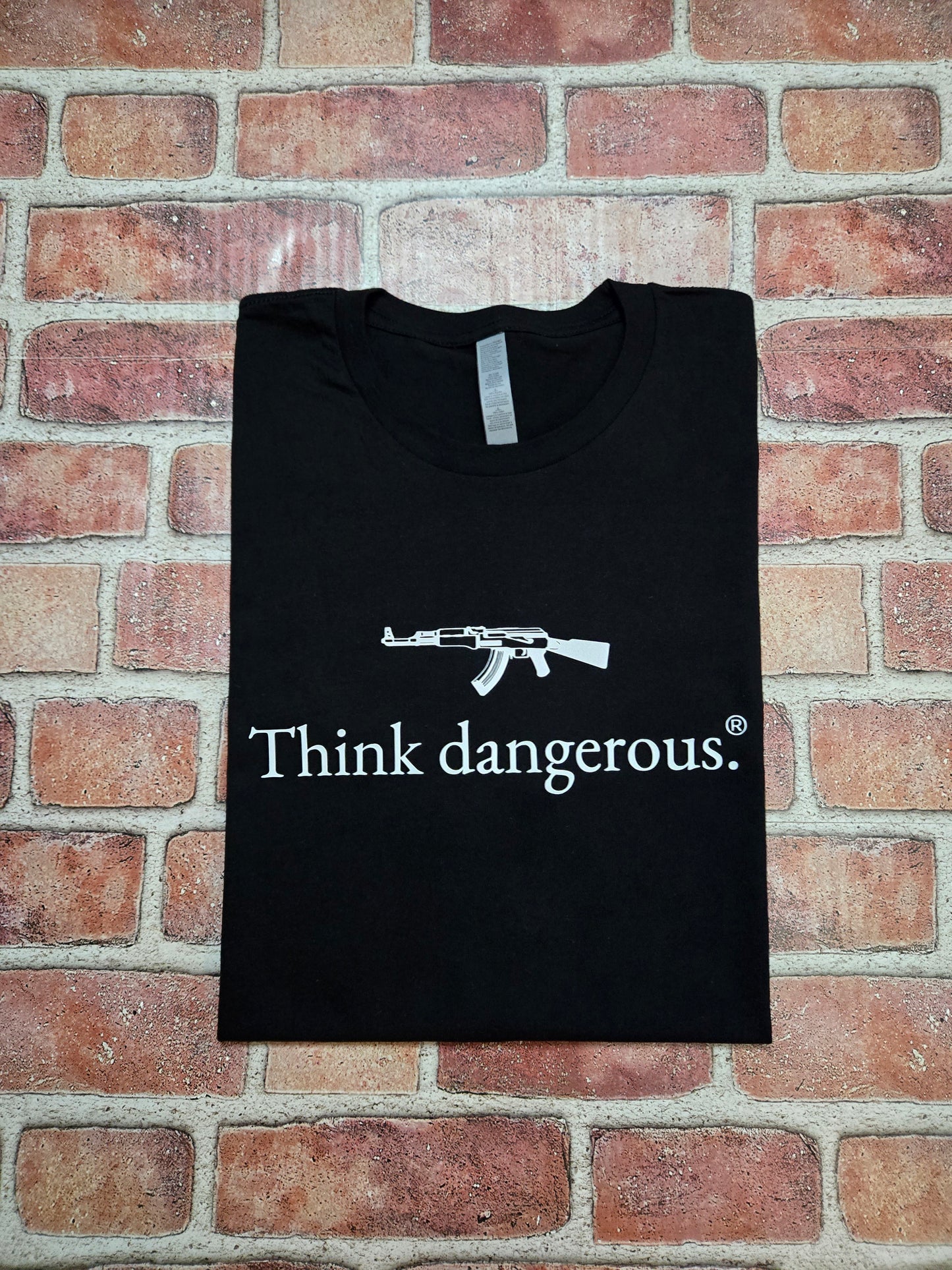 Think dangerous. T-Shirt