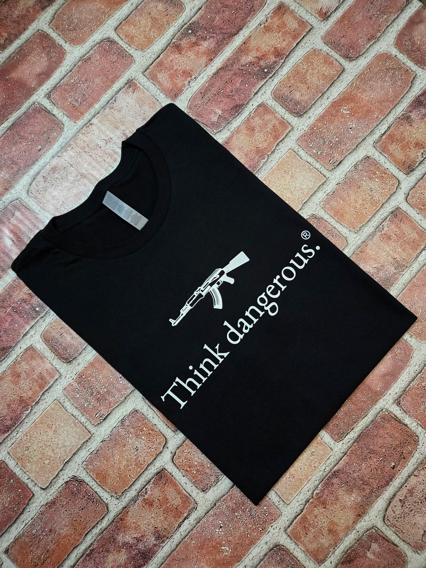 Think dangerous. T-Shirt